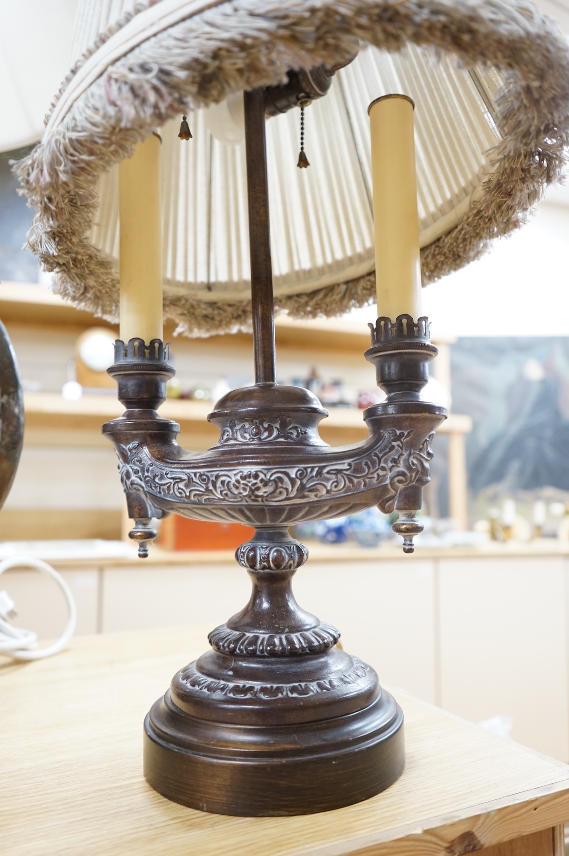 A Frederick Cooper Bouillotte lamp, together with a hammered metal table lamp, formed from a water flask (2)